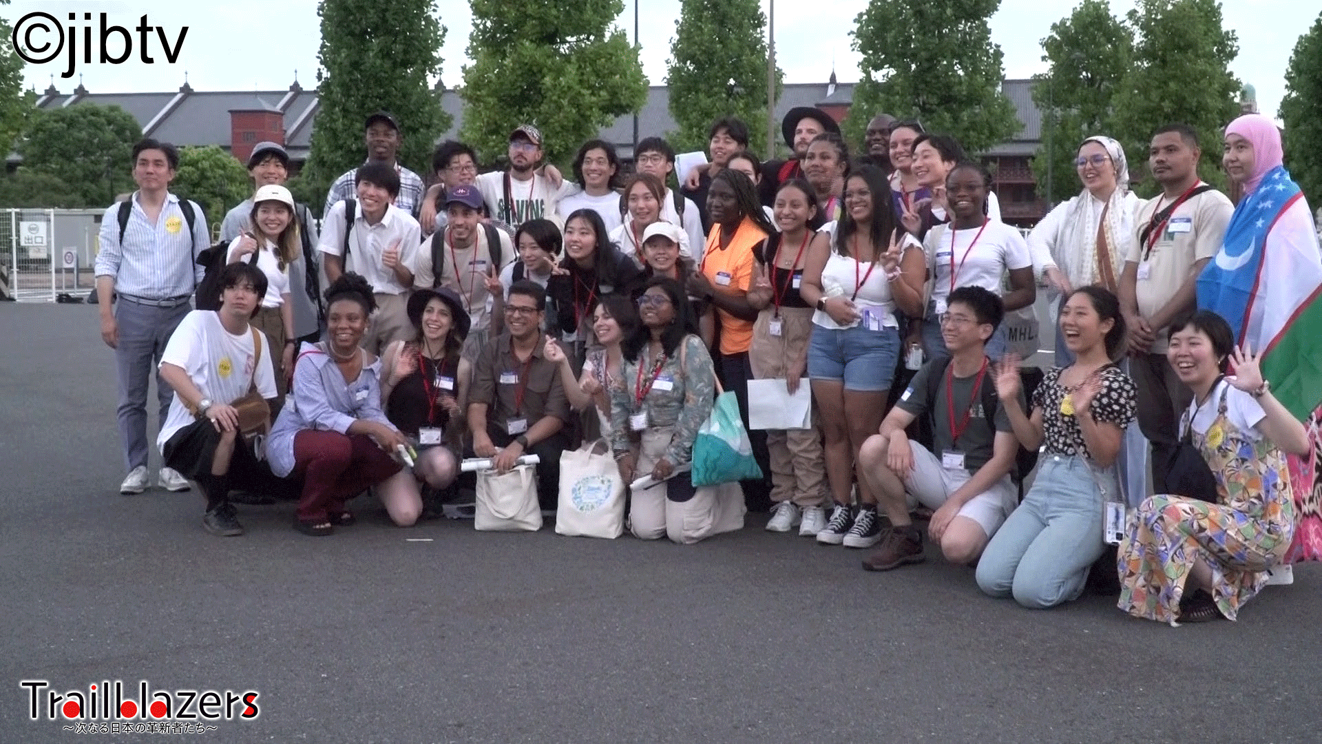 Large group of people posing for a photo in Yokohama for Trailblazers TV Show on NHK World Japan / jibtv