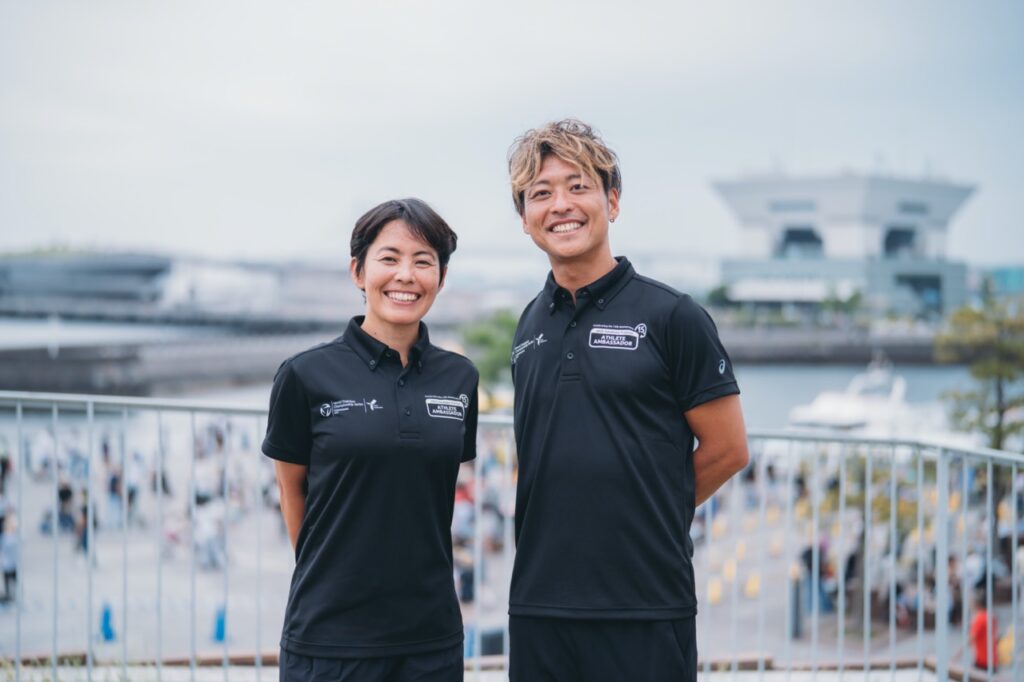 two people pose for the camera